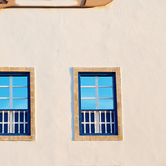 Image showing blue window in morocco africa old construction and brown wall  c