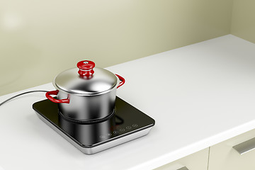Image showing Induction cooktop and cooking pot