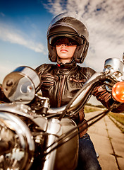 Image showing Biker girl on a motorcycle