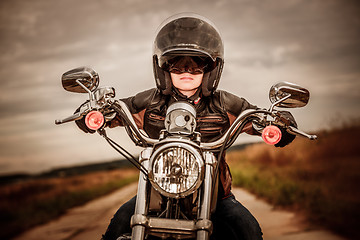 Image showing Biker girl on a motorcycle