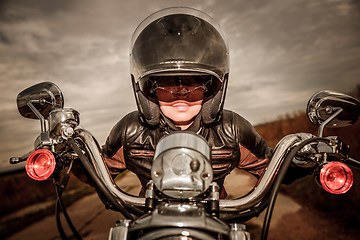 Image showing Biker girl on a motorcycle