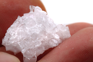 Image showing natural salt crystal in human hand