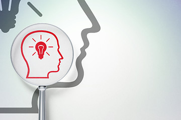 Image showing Learning concept:  Head With Lightbulb with optical glass on digital background