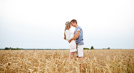 Image showing happy smiling young hippie couple outdoors