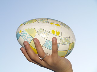 Image showing holding easter egg