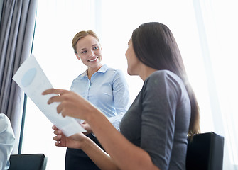 Image showing smiling businesswomen meeting in office