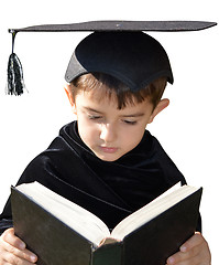 Image showing Cute kid graduate with graduation cap