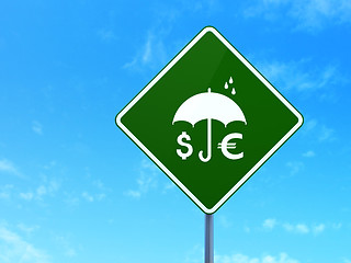 Image showing Privacy concept: Money And Umbrella on road sign background