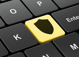 Image showing Safety concept: Shield on computer keyboard background