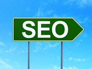 Image showing Web development concept: SEO on road sign background