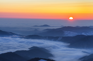 Image showing Foggy winter sunrise