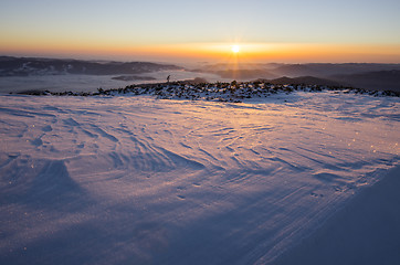 Image showing Winter sunrise over frozen landscape