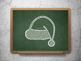 Image showing Entertainment, concept: Christmas Hat on chalkboard background