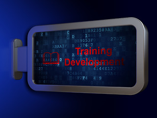 Image showing Education concept: Training Development and Book on billboard background