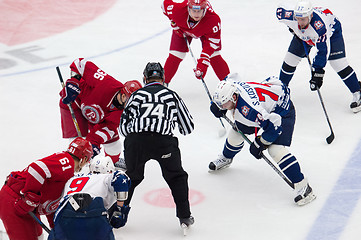 Image showing A. Nikulin (36) and S. Kostitsyn (74) on face-off