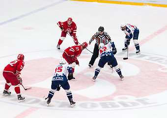 Image showing Y. Koksharov (27) and D. Semin (42) on face-off