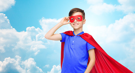 Image showing boy in red superhero cape and mask