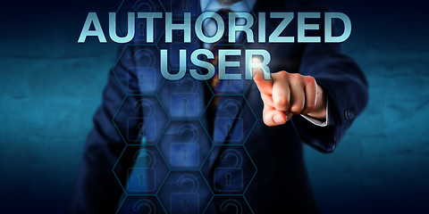 Image showing Manager Pressing AUTHORIZED USER Onscreen