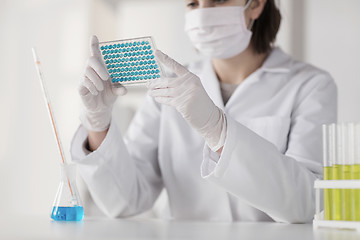 Image showing close up of scientist making test in lab