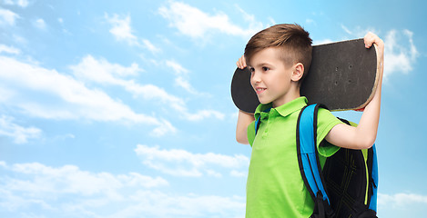 Image showing happy student boy with backpack and skateboard