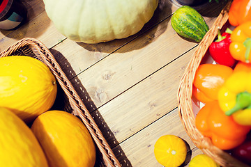 Image showing vegetables in baskets on table at market or farm