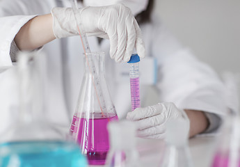 Image showing close up of scientist making test in lab