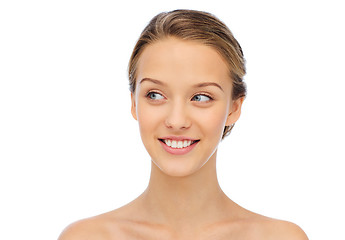 Image showing smiling young woman face and shoulders