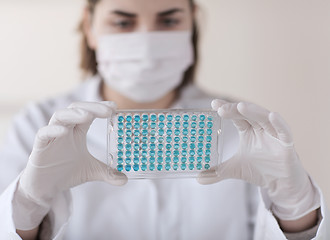 Image showing close up of scientist making test in lab