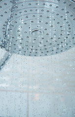 Image showing Shower head with flowing water