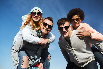 Image showing happy friends in shades having fun outdoors