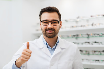 Image showing man with glasses and thumbs up at optics store