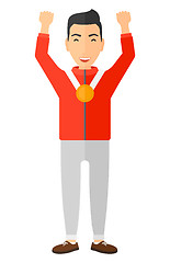 Image showing Athlete with medal and hands raised.