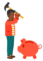 Image showing Man breaking piggy bank.