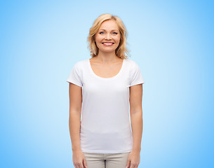 Image showing smiling middle aged woman in blank white t-shirt