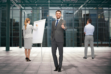 Image showing group of smiling businesspeople