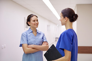 Image showing medics, nurses or doctors talking at hospital