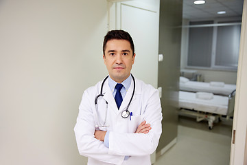 Image showing doctor with stethoscope at hospital corridor