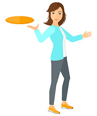 Image showing Woman playing frisbee.