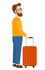 Image showing Man standing with suitcase.