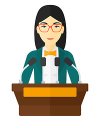 Image showing Woman speaking on podium.