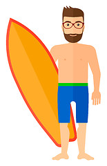 Image showing Surfer holding surfboard.