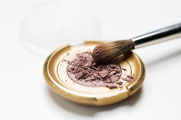 Image showing close up of makeup brush and eyeshadow