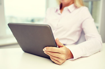 Image showing close up of businesswoman hands with tablet pc