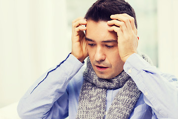 Image showing close up of ill man with flu and headache at home