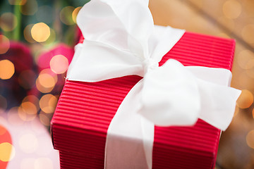 Image showing close up of red gift box with white bow