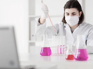 Image showing close up of scientist making test in lab