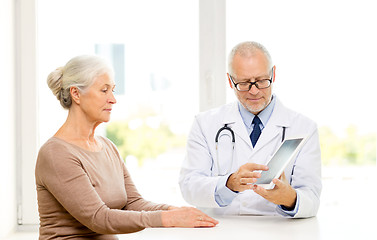 Image showing senior woman and doctor with tablet pc
