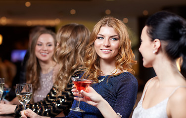 Image showing happy women with drinks at night club