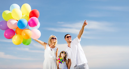 Image showing family with colorful balloons