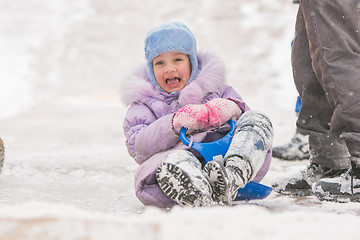 Image showing Five-year girl rolled down ice slides nearly crashed into other children